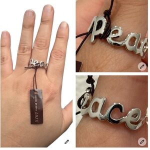 Henri Bendel Luxe PEACE Ring Size‎ 8 Silver Tone